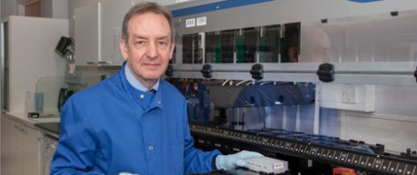 Photo of Professor Ian Deary, loading the last of the Lothian Birth Cohort samples, gene sequencing - credit University of Edinburgh 