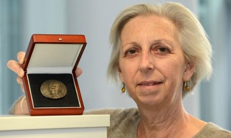 photo of Eleanor Riley with 2019 Ronald Ross medal - credit The Roslin Institute