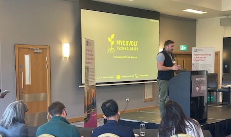 Sam Jellard, Mycovolt Technologies presenting on stage at BBSRC event